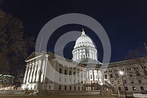 Dramatic view of the Wisconsin State Capitol building lit up at
