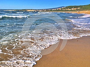 Dramatic waves on the beach of Is Arenas