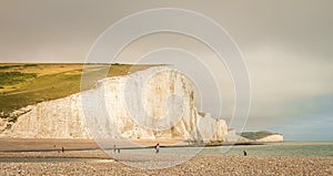 Dramatic white cliffs and beach at Cuckmere Haven, Seven Sisters Country Park photo