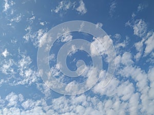 Dramatic White Clouds in a Blue Sky Background. Heavenly feeling white Cloud in a summer season at mid day