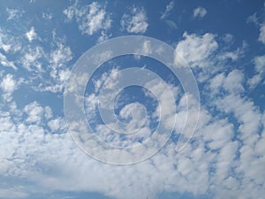 Dramatic White Clouds in a Blue Sky Background. Heavenly feeling white Cloud in a summer season at mid day