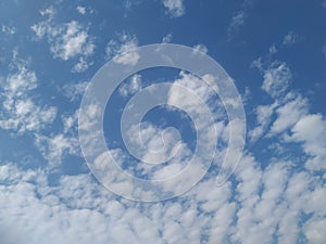 Dramatic White Clouds in a Blue Sky Background. Heavenly feeling white Cloud in a summer season at mid day