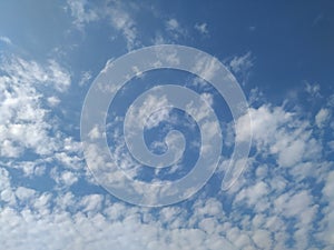 Dramatic White Clouds in a Blue Sky Background. Heavenly feeling white Cloud in a summer season at mid day