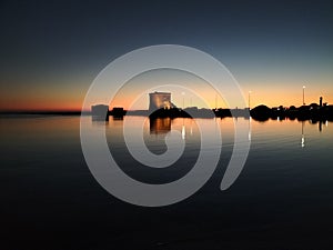 Dramatic winter landscape at dusk of Torre Chianca in Porto Cesareo, Lecce, Salento, Italy