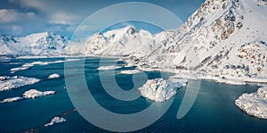 Dramatic winter view from flying drone of Sandvika bay, Leknes, Norway, Europe.