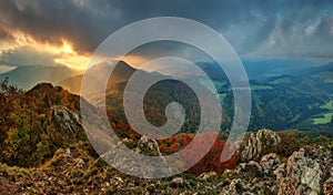 Dramatically illuminated sky. View from the top of The Vapec hill in The Strazov Mountains