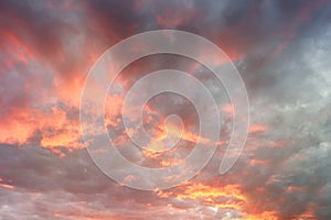 Dramatics sunset sky for background. Dramatic sunset sky with clouds glowing red