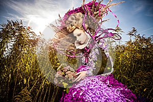 Dramatized image of sensual fashion girl - Art Fashion outdoor photo.