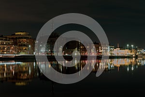 Drammenselva River flowing through Drammen at night