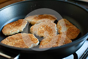 Draniki in a frying pan