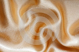 Drape satin gold fabric for the background