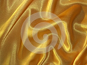 Draped golden (yellow) satin fabric