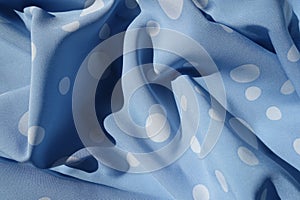 Draped light blue rayon with polka dot pattern