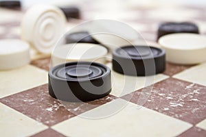 Draughs or checkers on old paper board