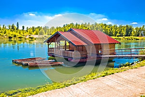 Drava river floating wooden cabin