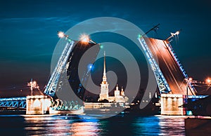 A drawbridge of Saint Petersburg at night and fortress between it