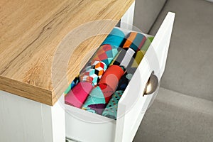 Drawer with different colorful socks