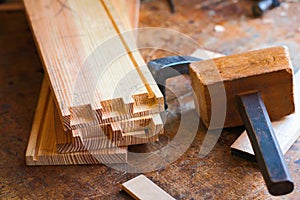 Drawer parts with blind dovetails on a cabinet makers bench.