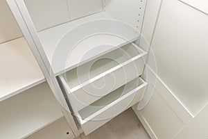 drawers and metal accessory for white cabinet interiors