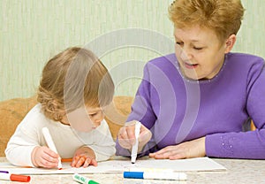 Drawing baby with her grandma