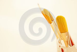 Drawing brushes, set of paint brushes on white background, copy space. Craft and art concept.