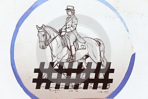 Drawing of a dressage horse and rider in uniform during equestrian event