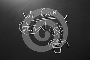 Drawing of flower, watering can and phrase `We can help` on chalkboard