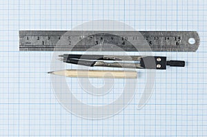 Drawing instruments lying on graph paper