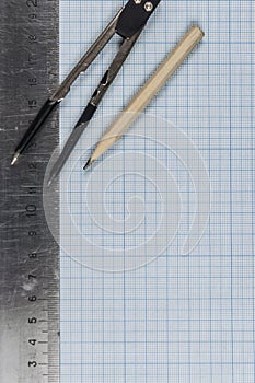 Drawing instruments lying on graph paper