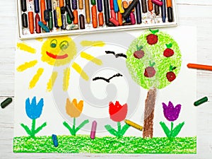 Drawing: landscape with apple tree, tulip flowers an happy sun.