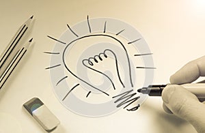 Drawing light bulb. concept ideas