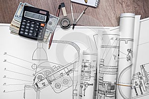 Drawing machine, pencil, ruler, us dollar and compasses