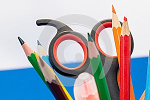 Drawing materials such as pencils, pencil sharpeners or scissors at school