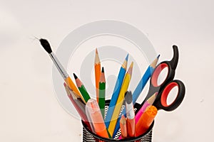 Drawing materials such as pencils, pencil sharpeners or scissors at school