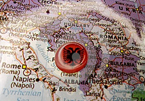 Drawing pin flag of Albania on the map