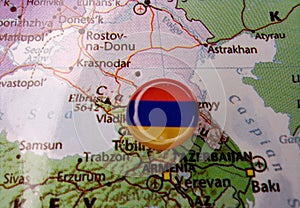 Drawing pin flag of Armenia on the map