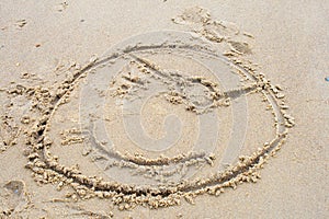 A drawing a pirate in the sand on beach