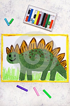 Drawing: Smiling dinosaur. Green weird stegosaurus