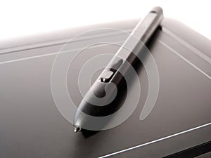 Drawing tablet with pencil photo