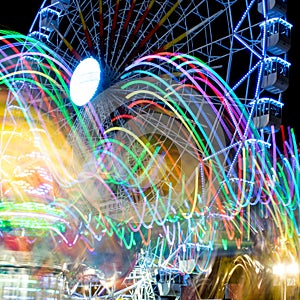 Drawings of lights and fair ferris wheel background