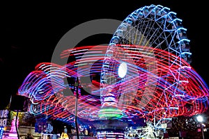 Drawings of lights and fair ferris wheel background