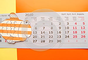 Drawn funny fish on the calendar, close-up. April fools ` day concept