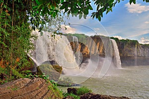 Dray Nour waterfall, against the blue sky, among the green equatorial vegetation, Daklak province, Vietnam