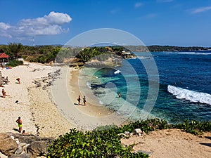 Dream beach - one of the most beautiful and photogenic beach on the Island of Nusa Lembongan in Bali, Indonesia. Deep blue waves