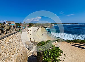 Dream beach - one of the most beautiful and photogenic beach on the Island of Nusa Lembongan in Bali, Indonesia. Deep blue waves