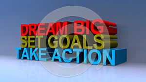 Dream big set goals take action on blue