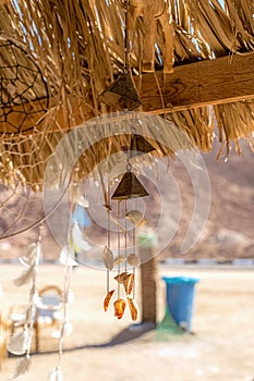 A dream catcher against the backdrop of the desert and mountains in Egypt