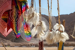 A dream catcher against the backdrop of the desert and mountains in Egypt