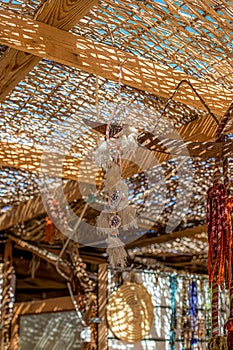 A dream catcher against the backdrop of the desert and mountains in Egypt