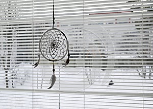 Dream catcher on bedroom window